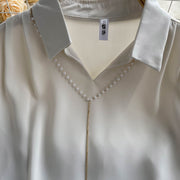 Nyla satin shirt with pearl chain